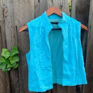Light blue fur vest